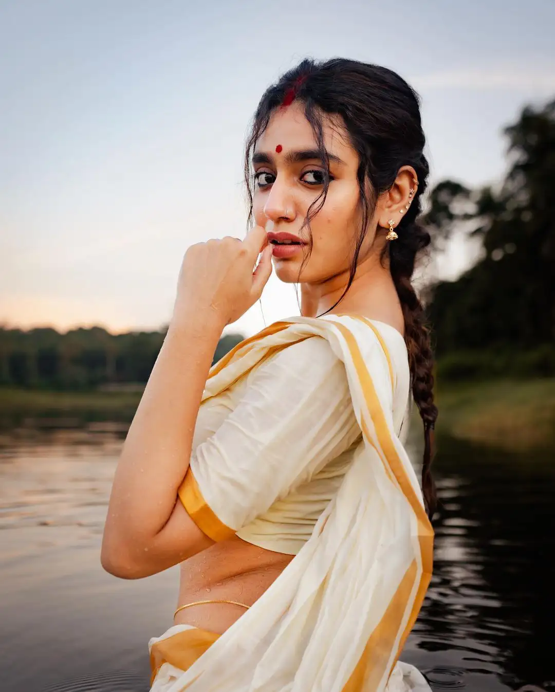 Priya Prakash Varrier Mesmerizing Saree Stills in Pond