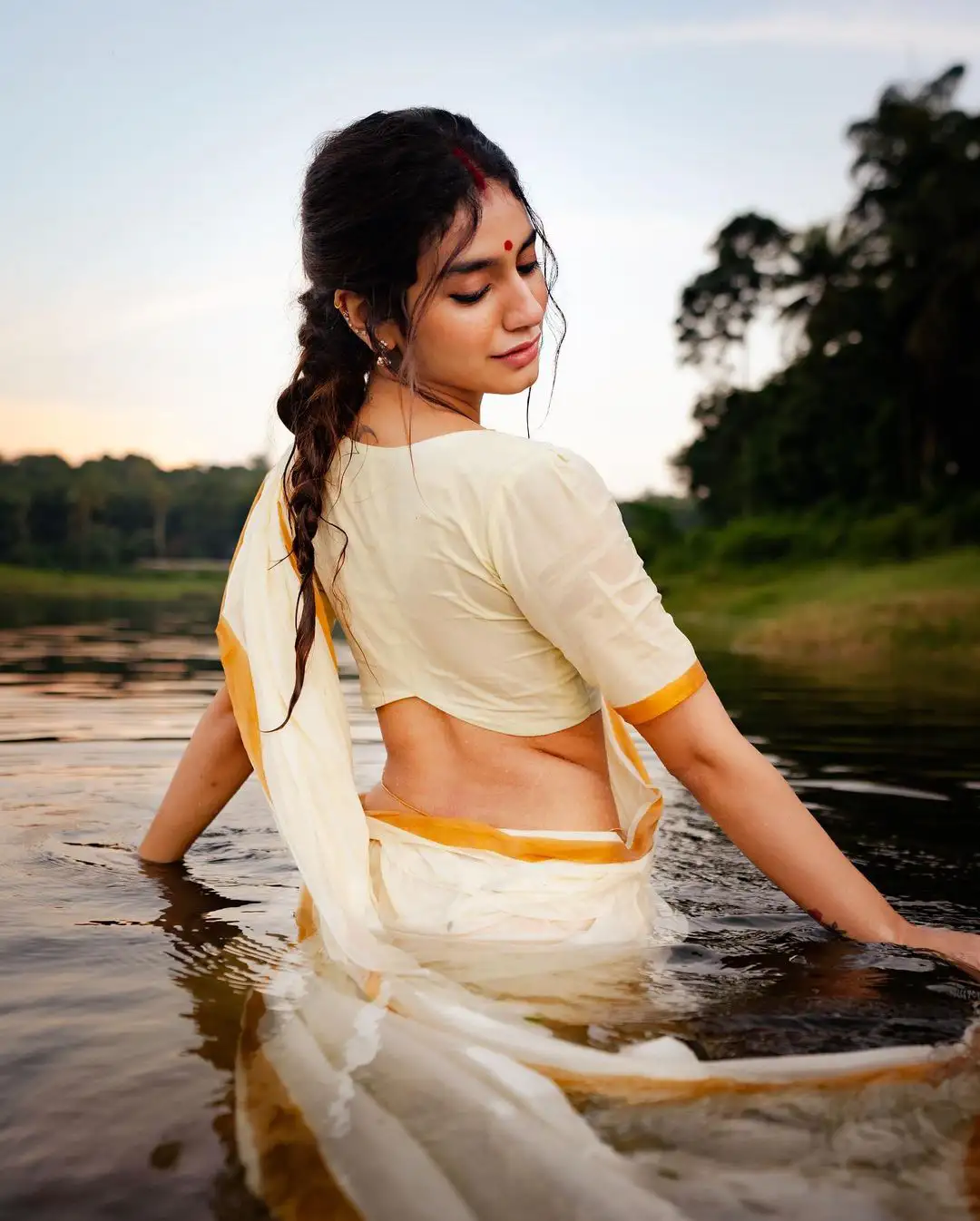 Priya Prakash Varrier Mesmerizing Saree Stills in Pond