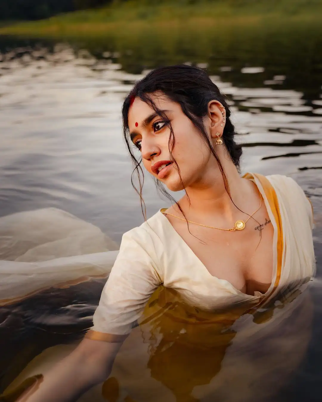 Priya Prakash Varrier Mesmerizing Saree Stills in Pond