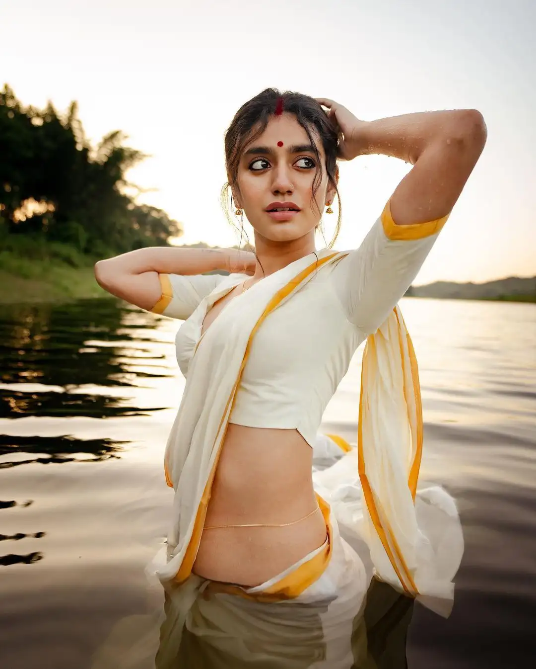Priya Prakash Varrier Mesmerizing Saree Stills in Pond