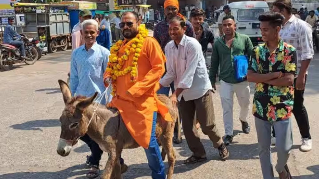 Man rides donkey to file nomination in madhya pradesh polls