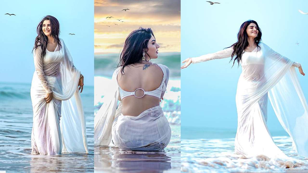 Varsha : తెల్లతెల్లని చీరలో.. సముద్రపు అంచున.. అందాలను ఆరబోస్తున్న వర్ష