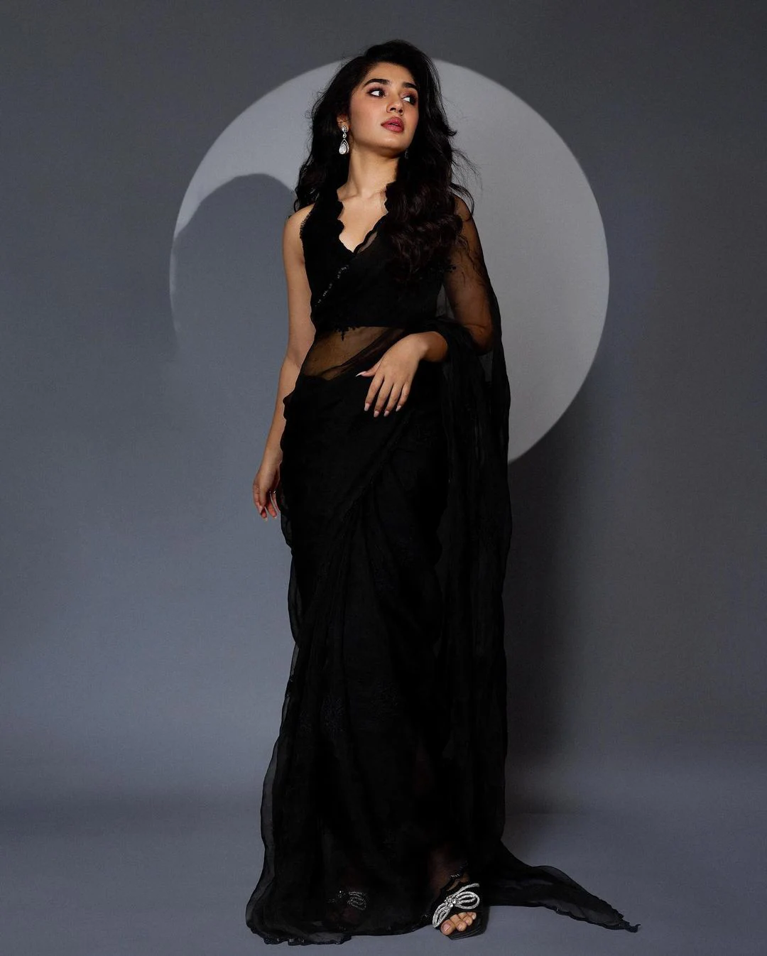 Tollywood Heroine Krithi Shetty shines in black saree photos