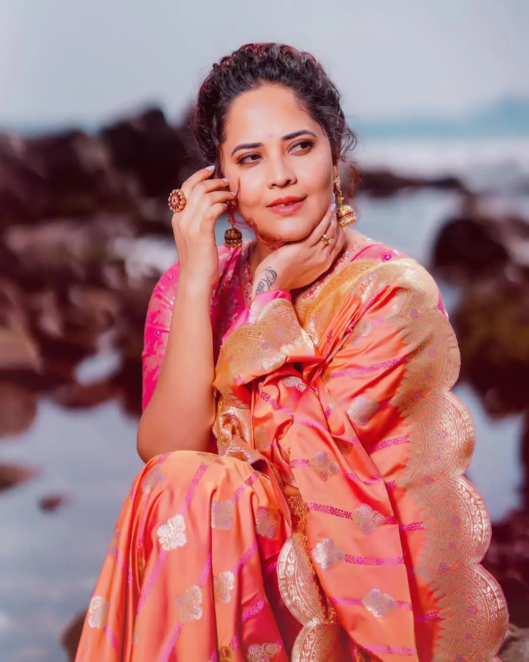 Anasuya Bharadwaj Saree Photos at Beach