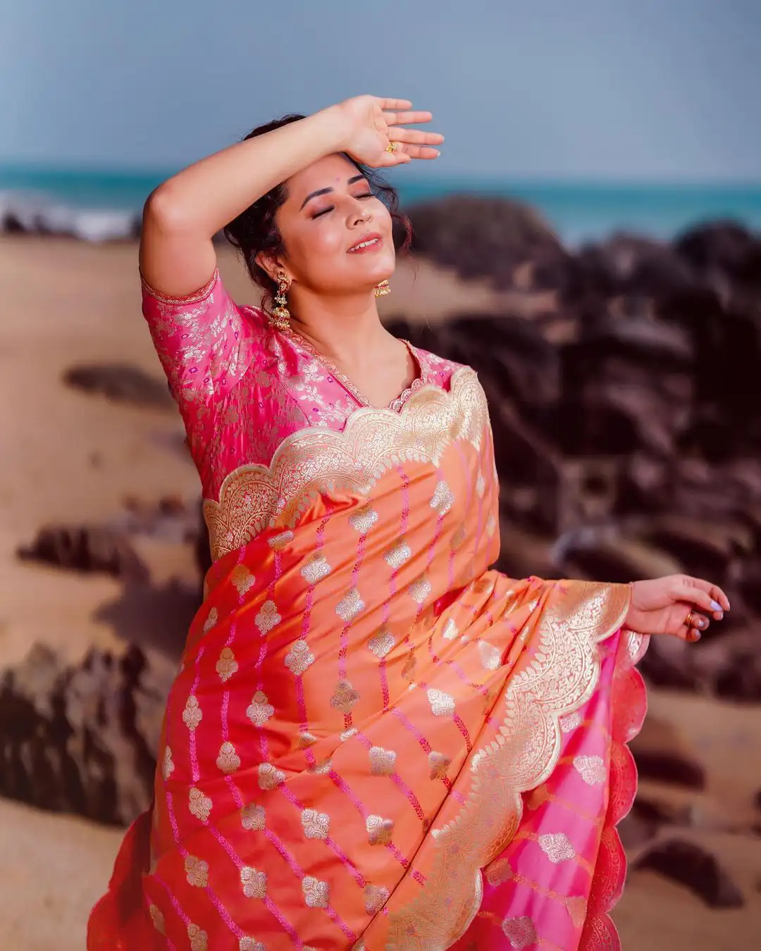 Anasuya Bharadwaj Saree Photos at Beach