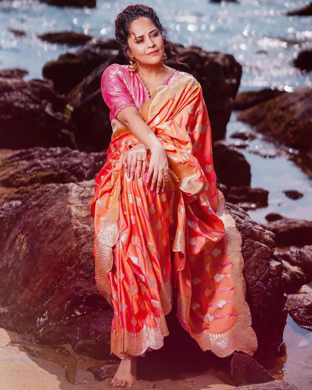 Anasuya Bharadwaj Saree Photos at Beach