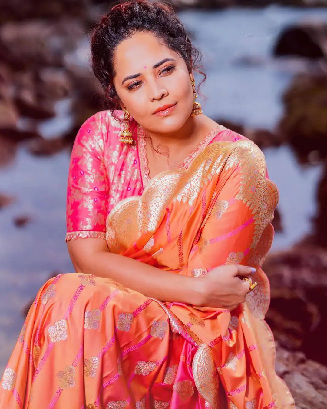 Anasuya Bharadwaj Saree Photos at Beach
