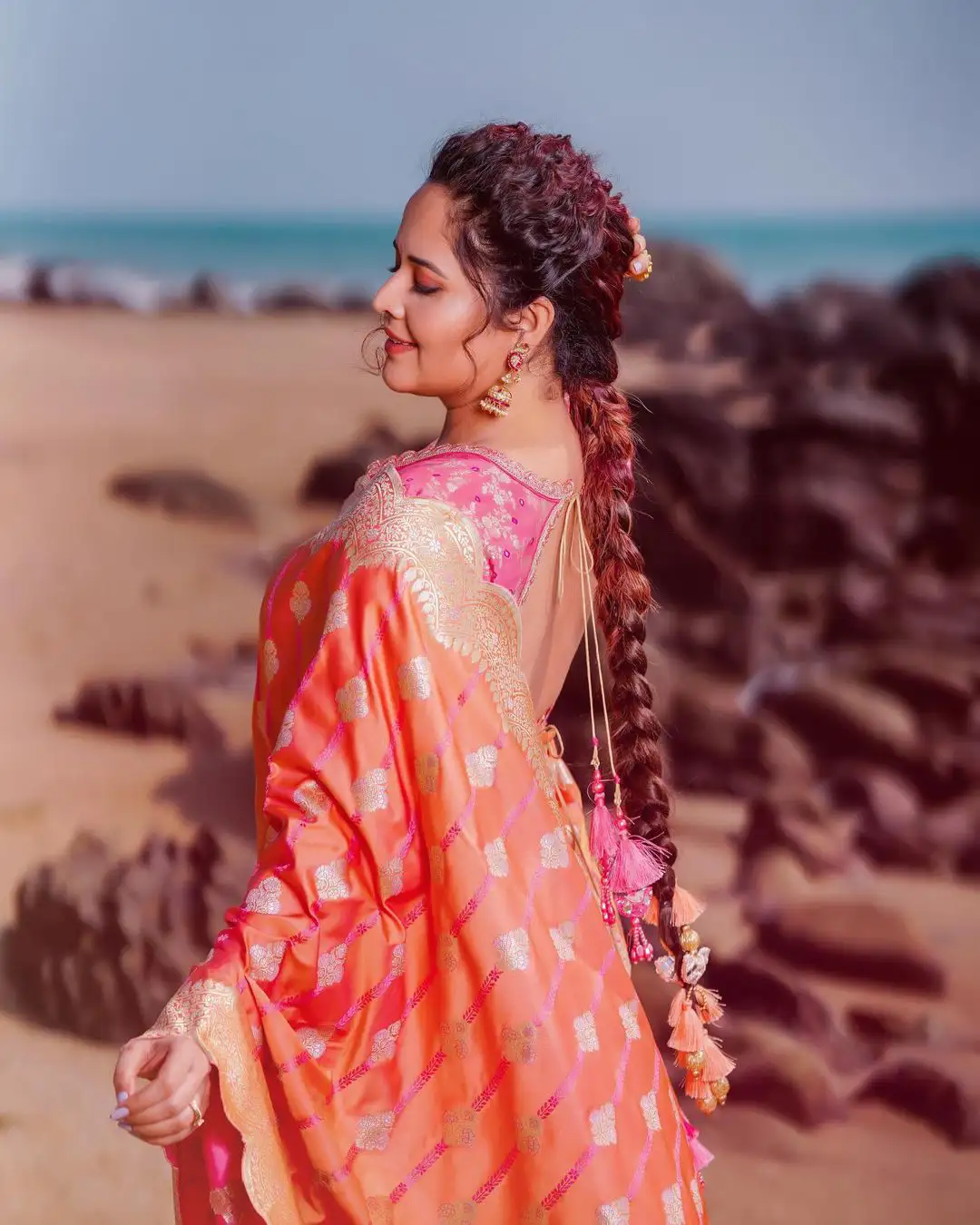 Anasuya Bharadwaj Saree Photos at Beach