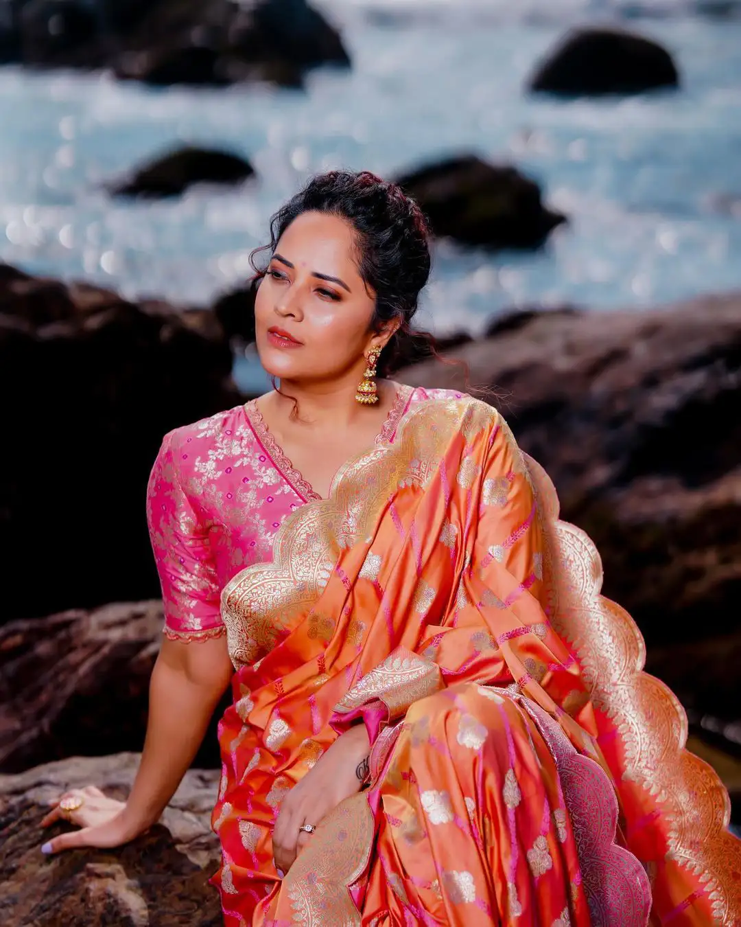 Anasuya Bharadwaj Saree Photos at Beach