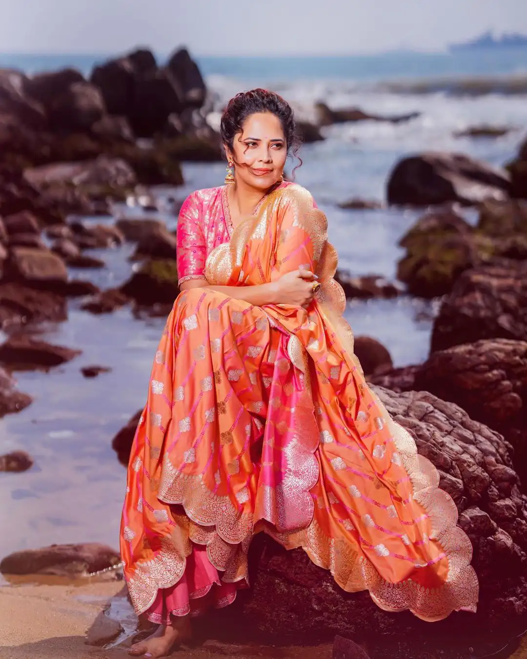 Anasuya Bharadwaj Saree Photos at Beach