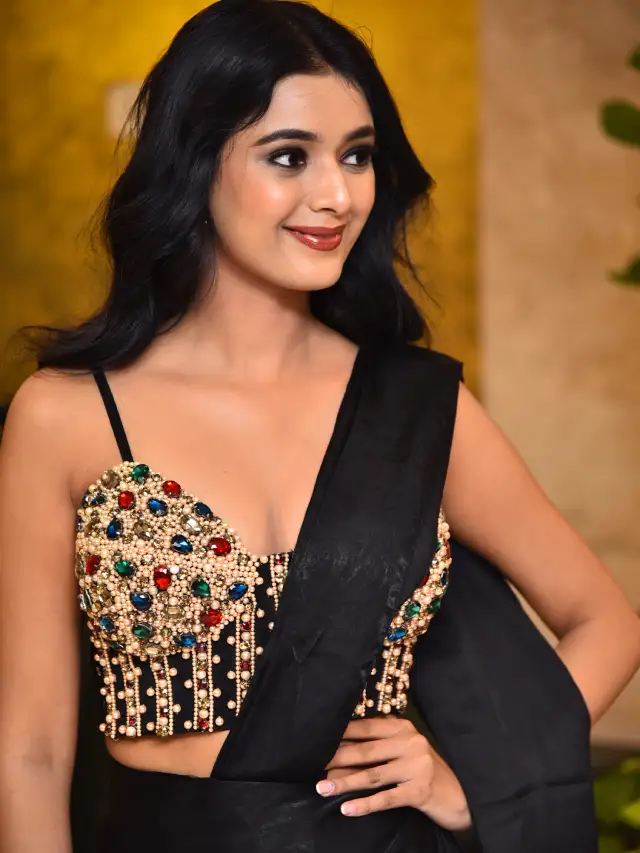 Neha Solanki Stunning Looks in Black Saree at Game On Pre Release Event