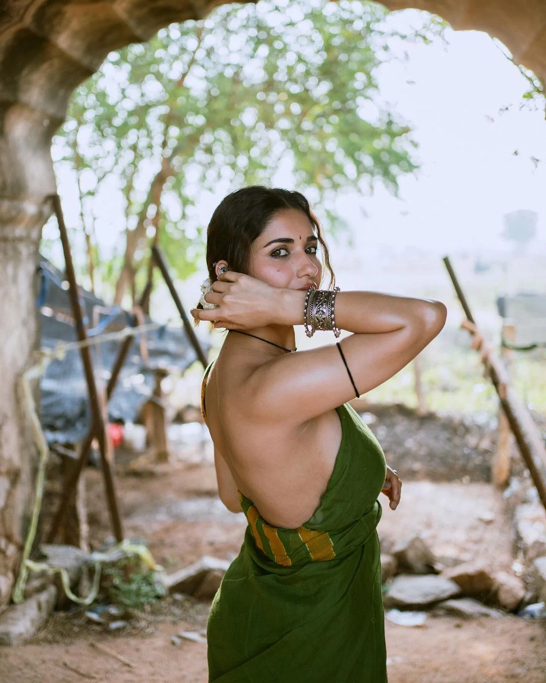 Ruhani Sharma Stunning Back Less Photos with Village Girl Looks