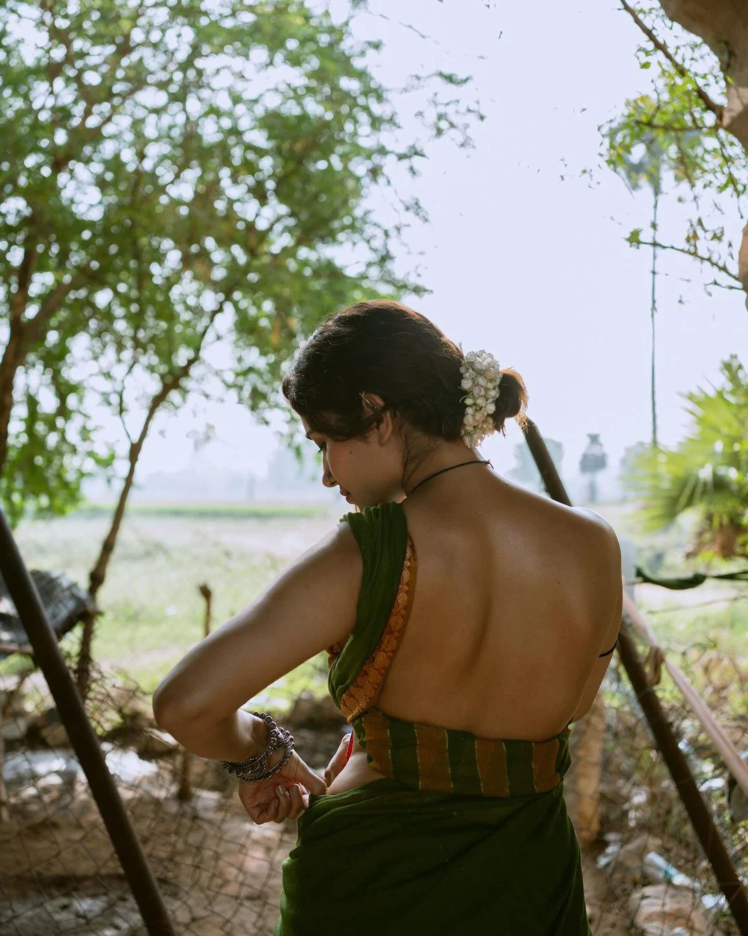 Ruhani Sharma Stunning Back Less Photos with Village Girl Looks