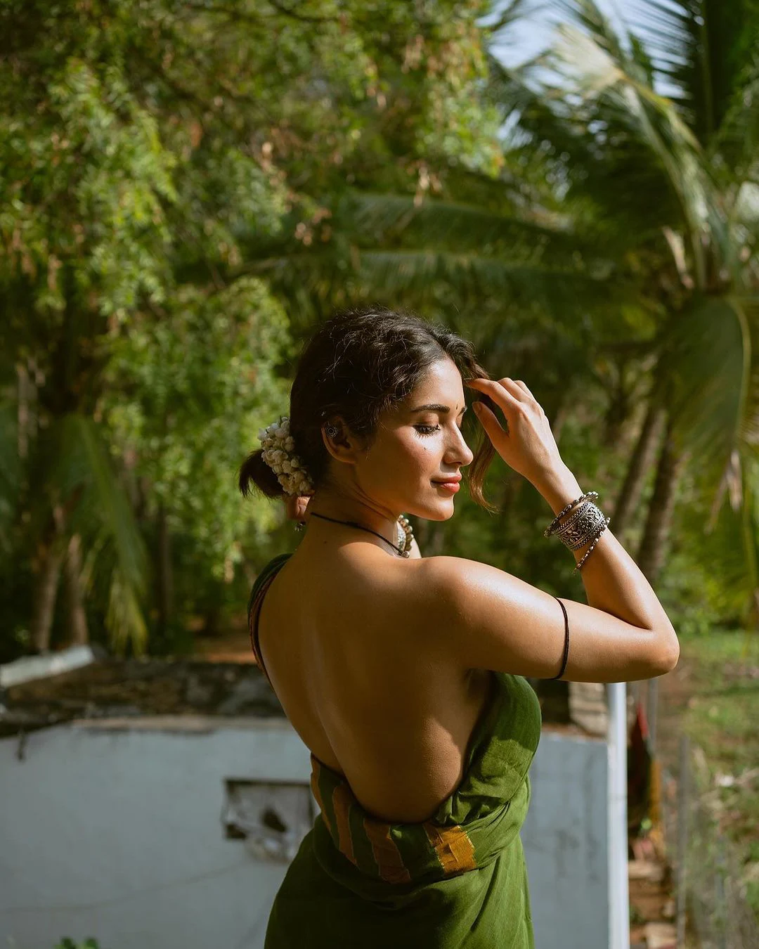 Ruhani Sharma Stunning Back Less Photos with Village Girl Looks