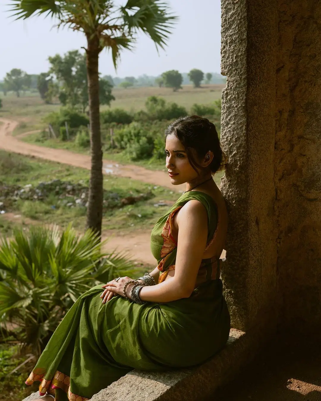 Ruhani Sharma Stunning Back Less Photos with Village Girl Looks
