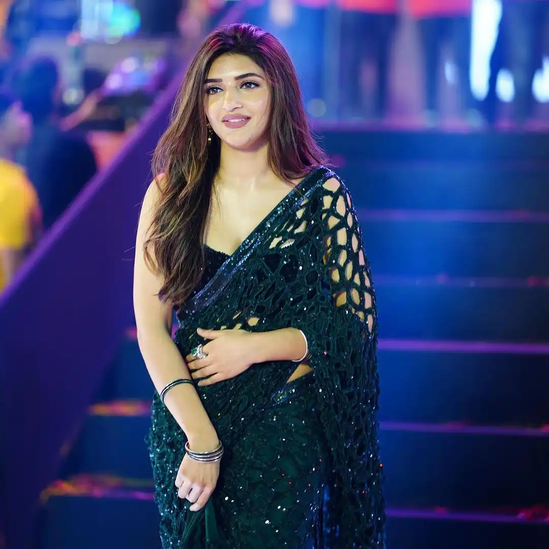 Sreeleela Mesmerizing Looks in Black Saree at Guntur Kaaram Pre Release Event