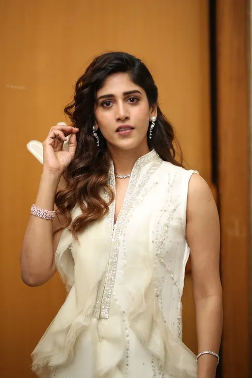 Chandini Chowdary Shines in White Dress at Music Shop Murthy Teaser Launch Event