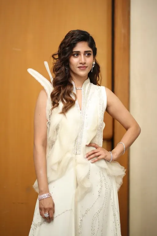 Chandini Chowdary Shines in White Dress at Music Shop Murthy Teaser Launch Event