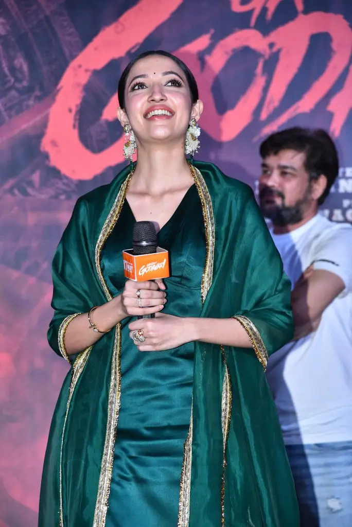 Neha Shetty Adorable Looks in Green Dress at Gangs of Godavari Teaser Launch Event