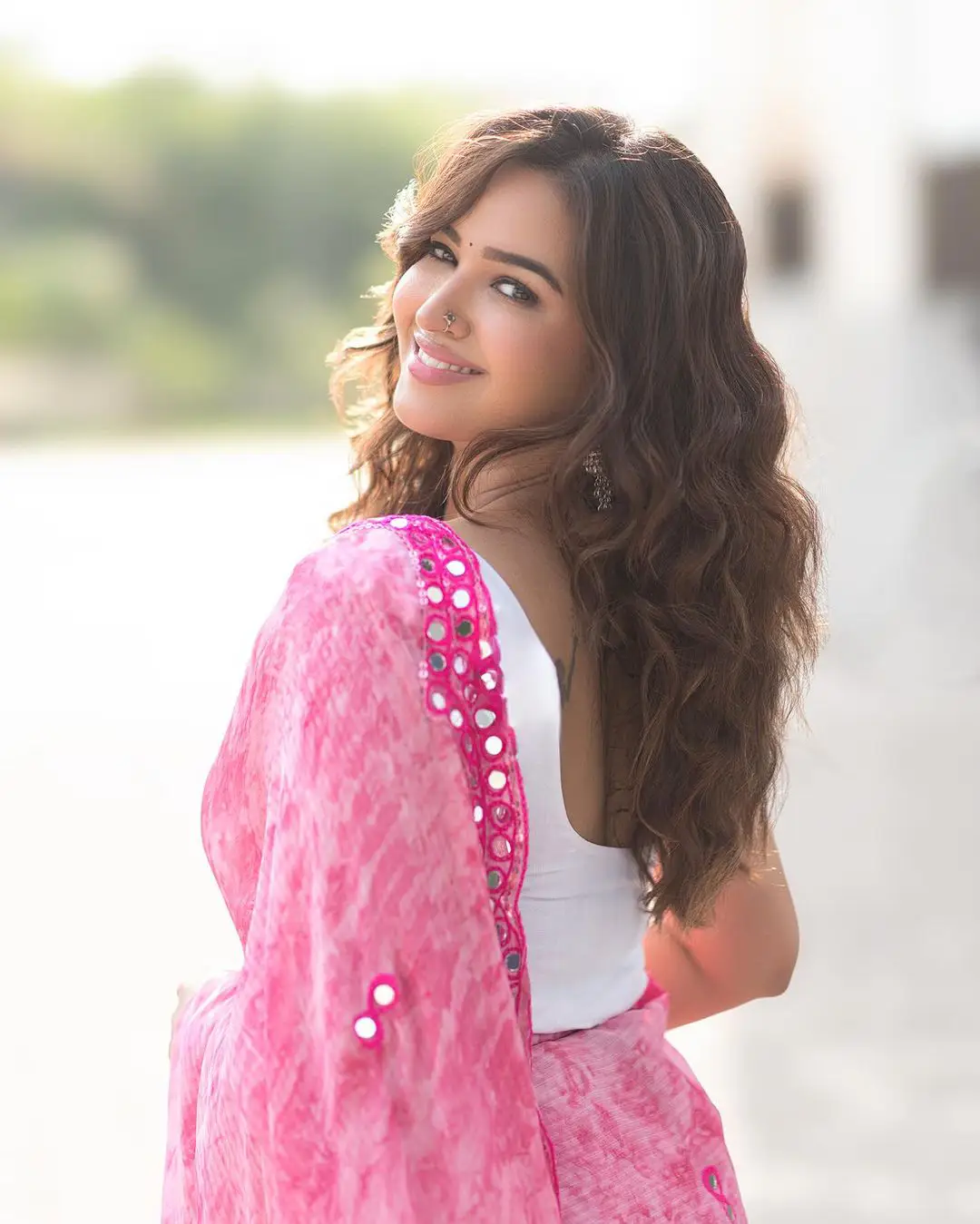 Pujiithaa Ponnada Cute Looks in Pink Saree