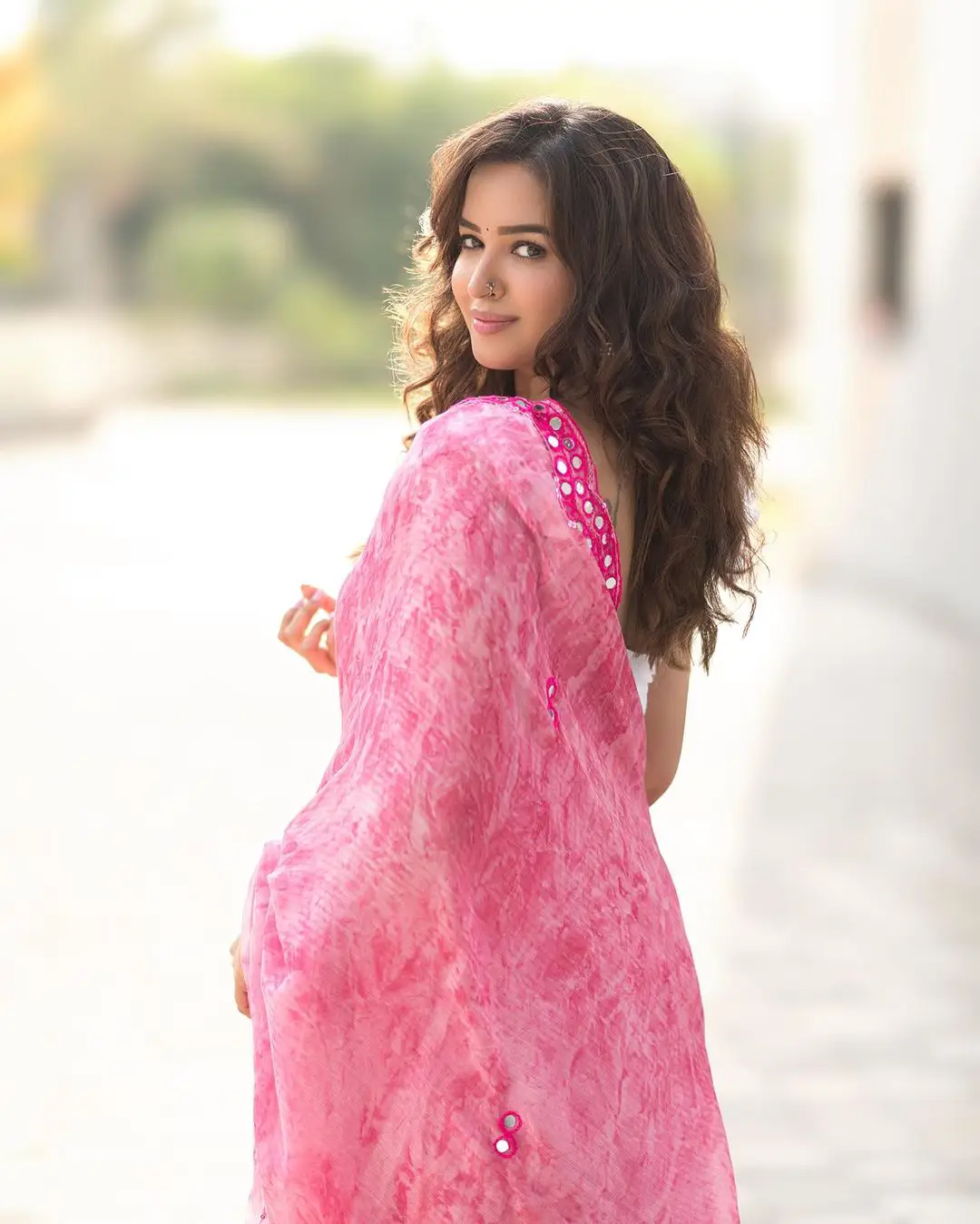 Pujiithaa Ponnada Cute Looks in Pink Saree