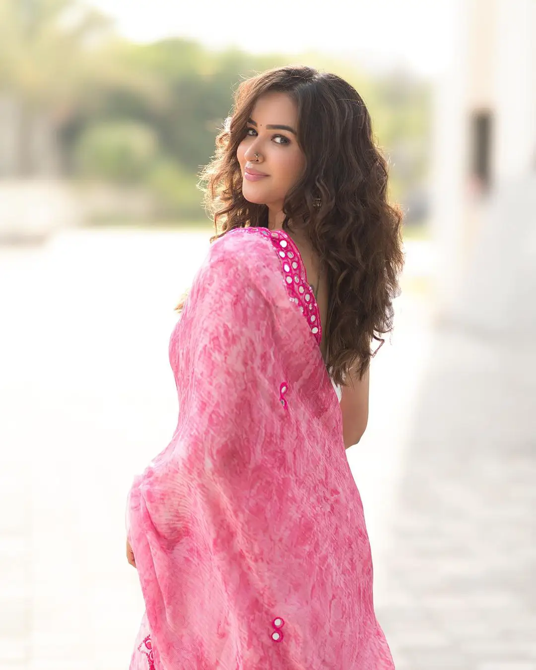 Pujiithaa Ponnada Cute Looks in Pink Saree