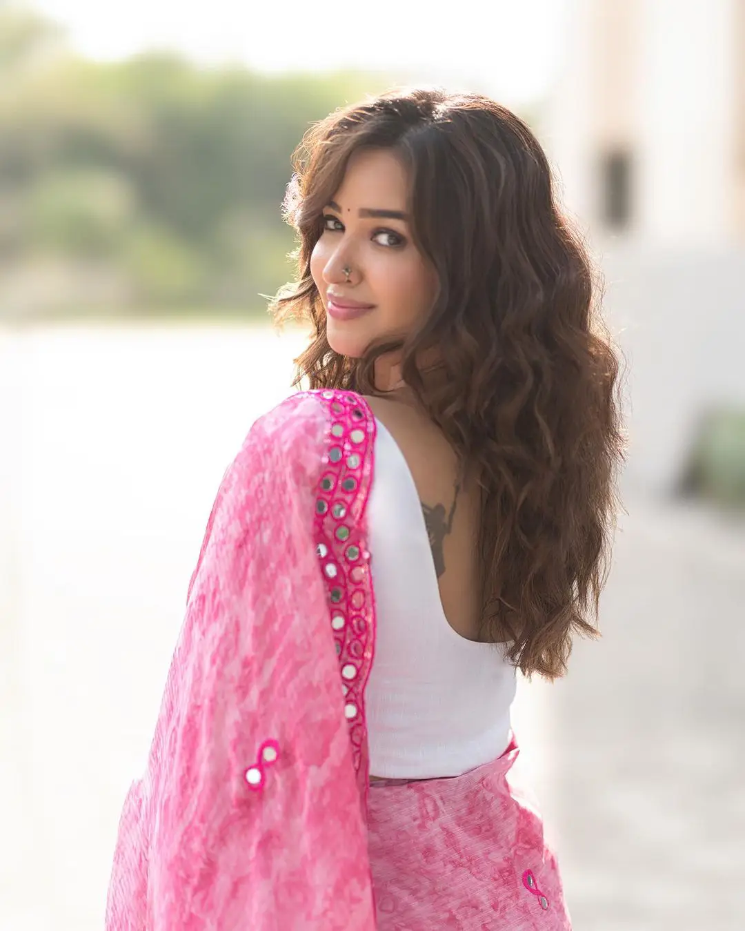 Pujiithaa Ponnada Cute Looks in Pink Saree