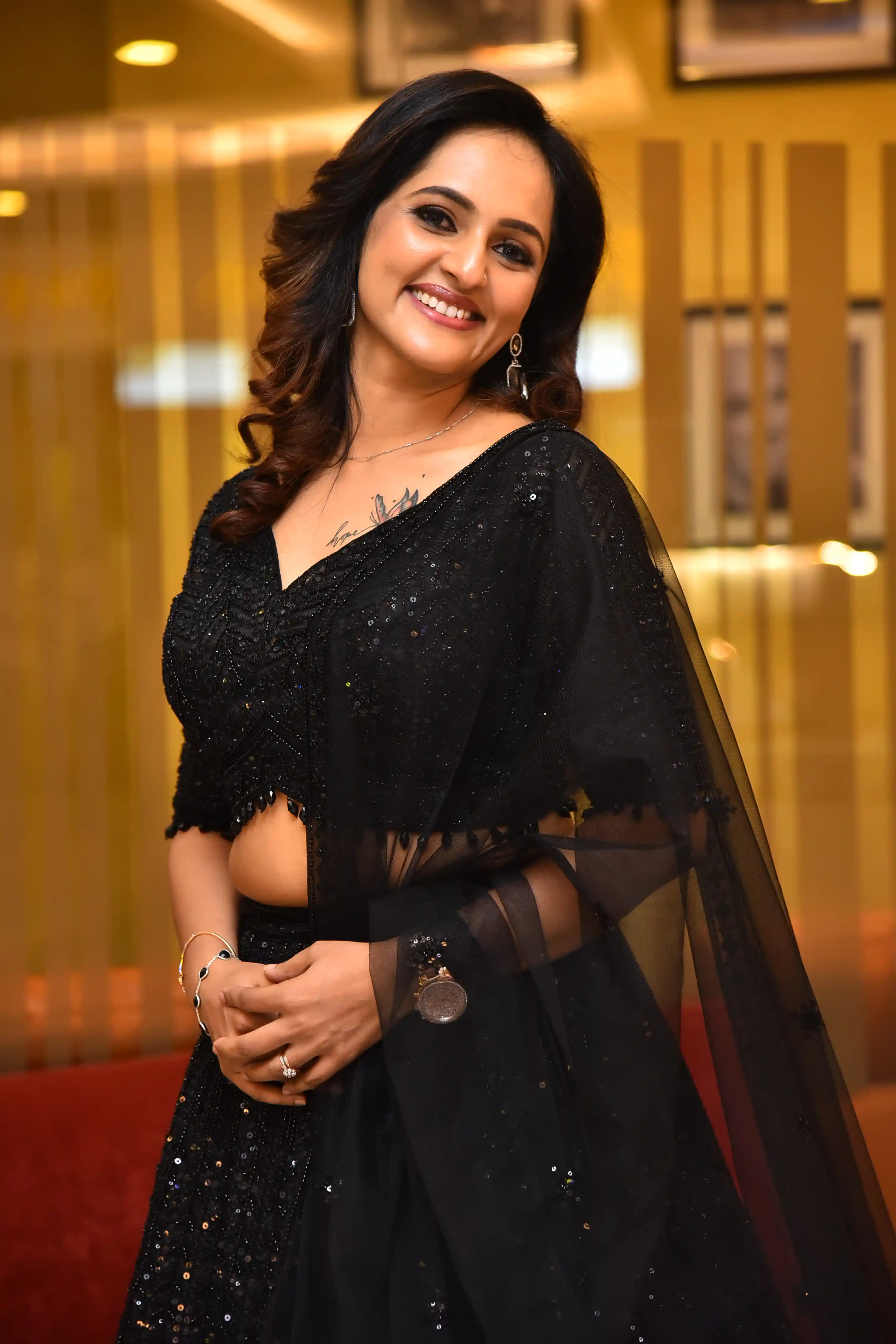 Jyothi Poorvaj Shines in Black Dress A Masterpiece Movie Teaser Release Event