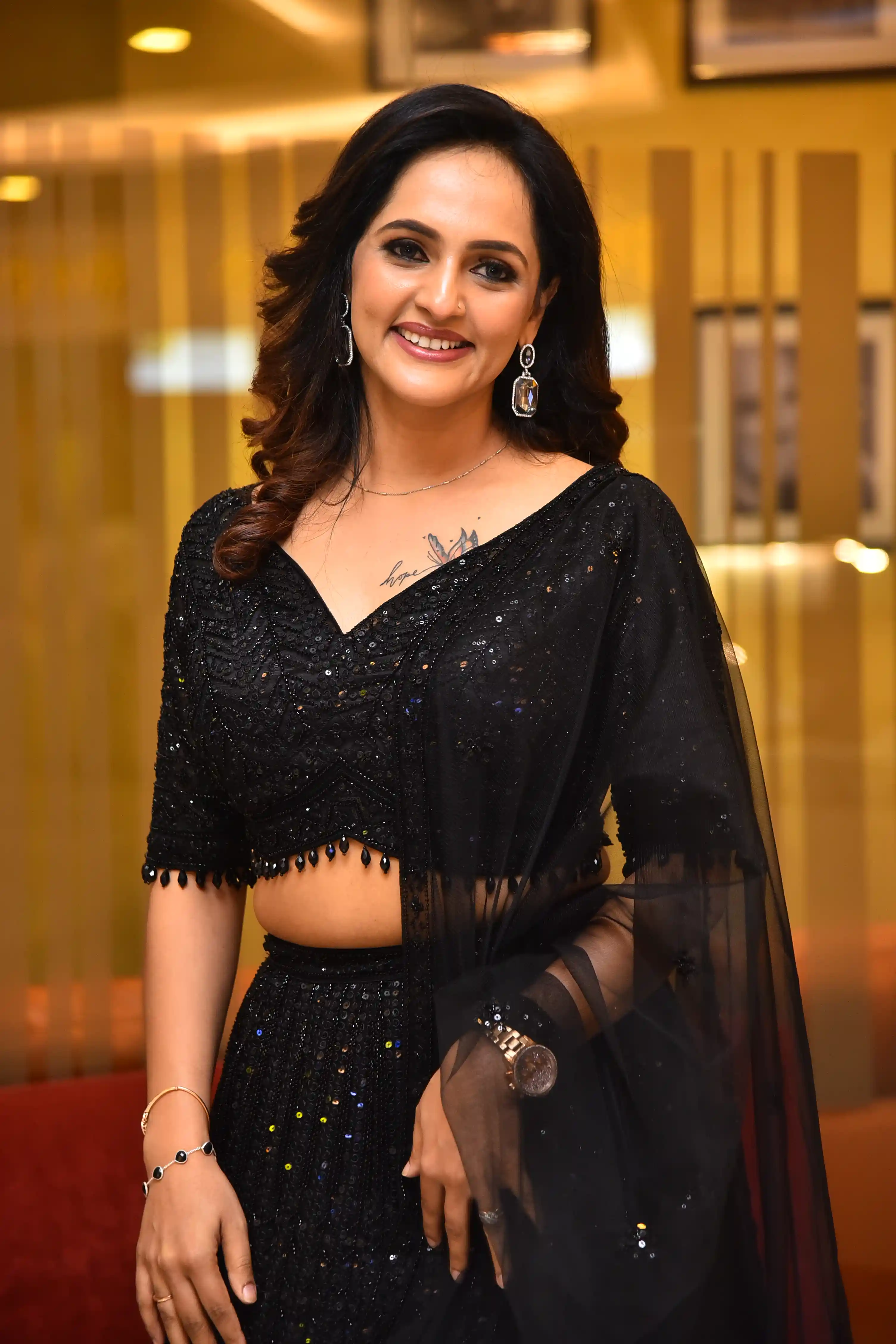 Jyothi Poorvaj Shines in Black Dress A Masterpiece Movie Teaser Release Event