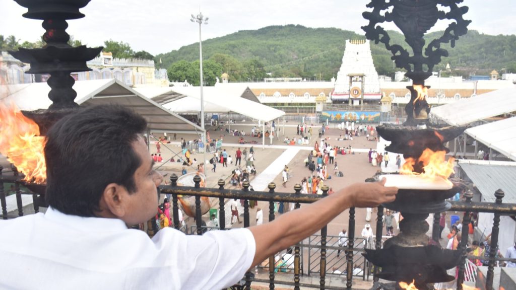 Balakrishna Fan Sridhar Varma Break 664 Coconuts at Tirumala Venkateswara Swami Temple on Balayya Birthday 