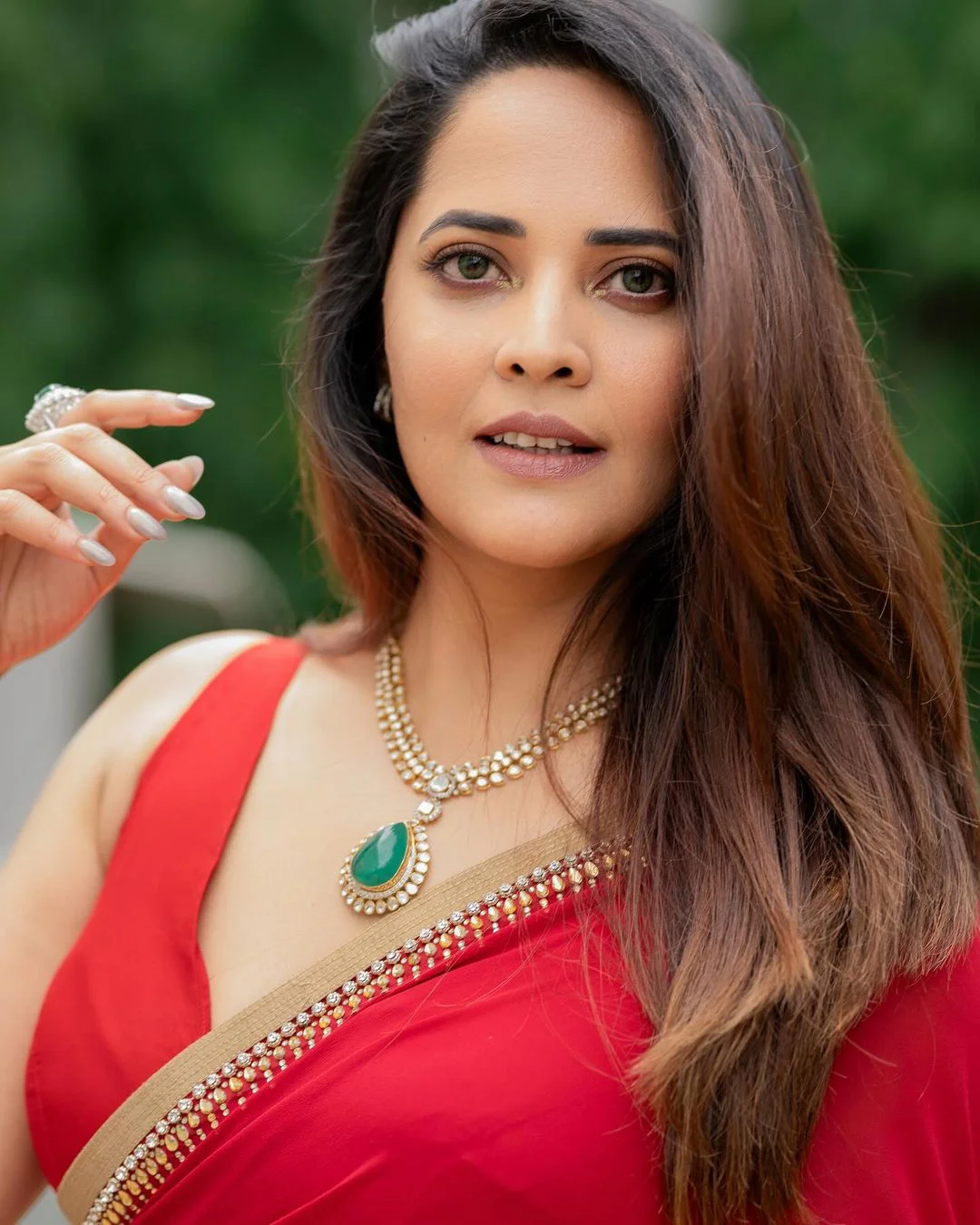 Anasuya Bharadwaj Awesome Looks in Red Saree