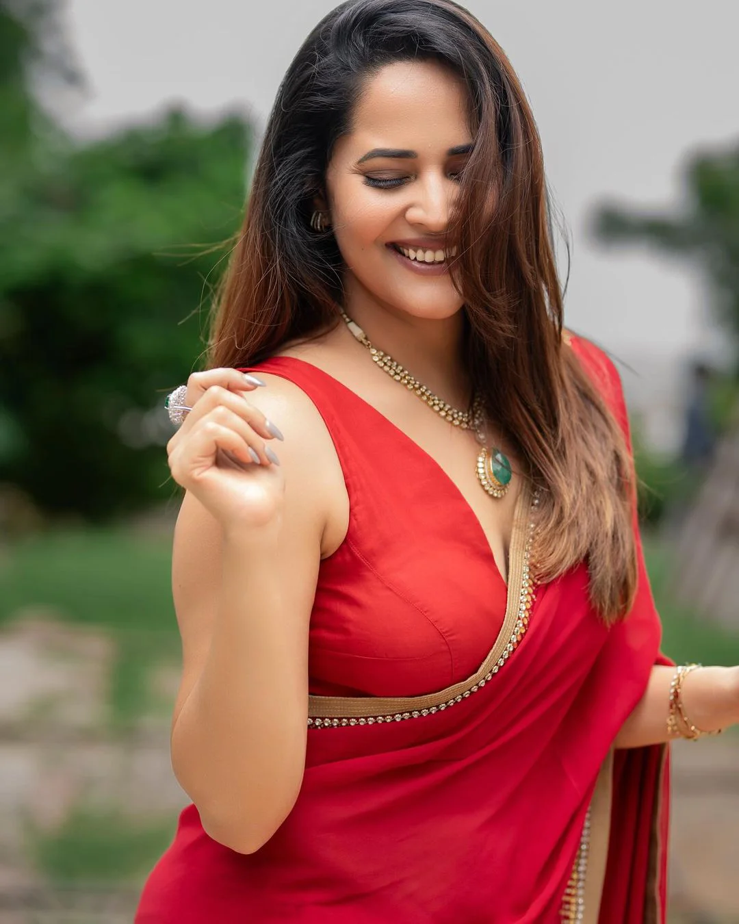 Anasuya Bharadwaj Awesome Looks in Red Saree