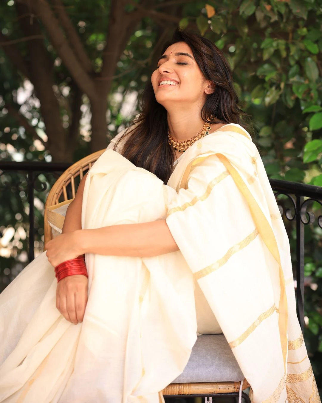 Mirnaa Menon Onam Special Photos in Saree