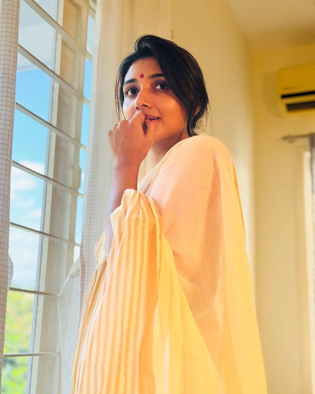 Mirnaa Menon Onam Special Photos in Saree