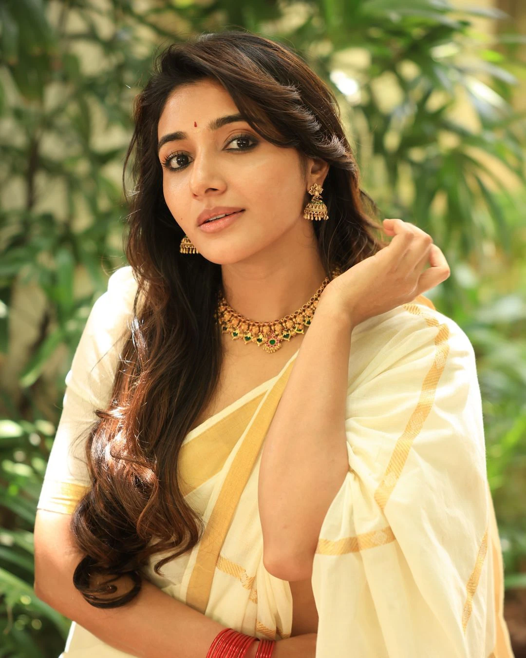 Mirnaa Menon Onam Special Photos in Saree
