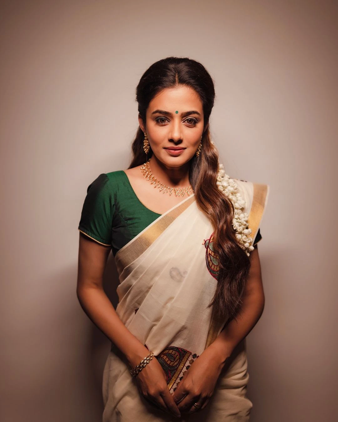 Priya Mani Onam Special Photos in Saree