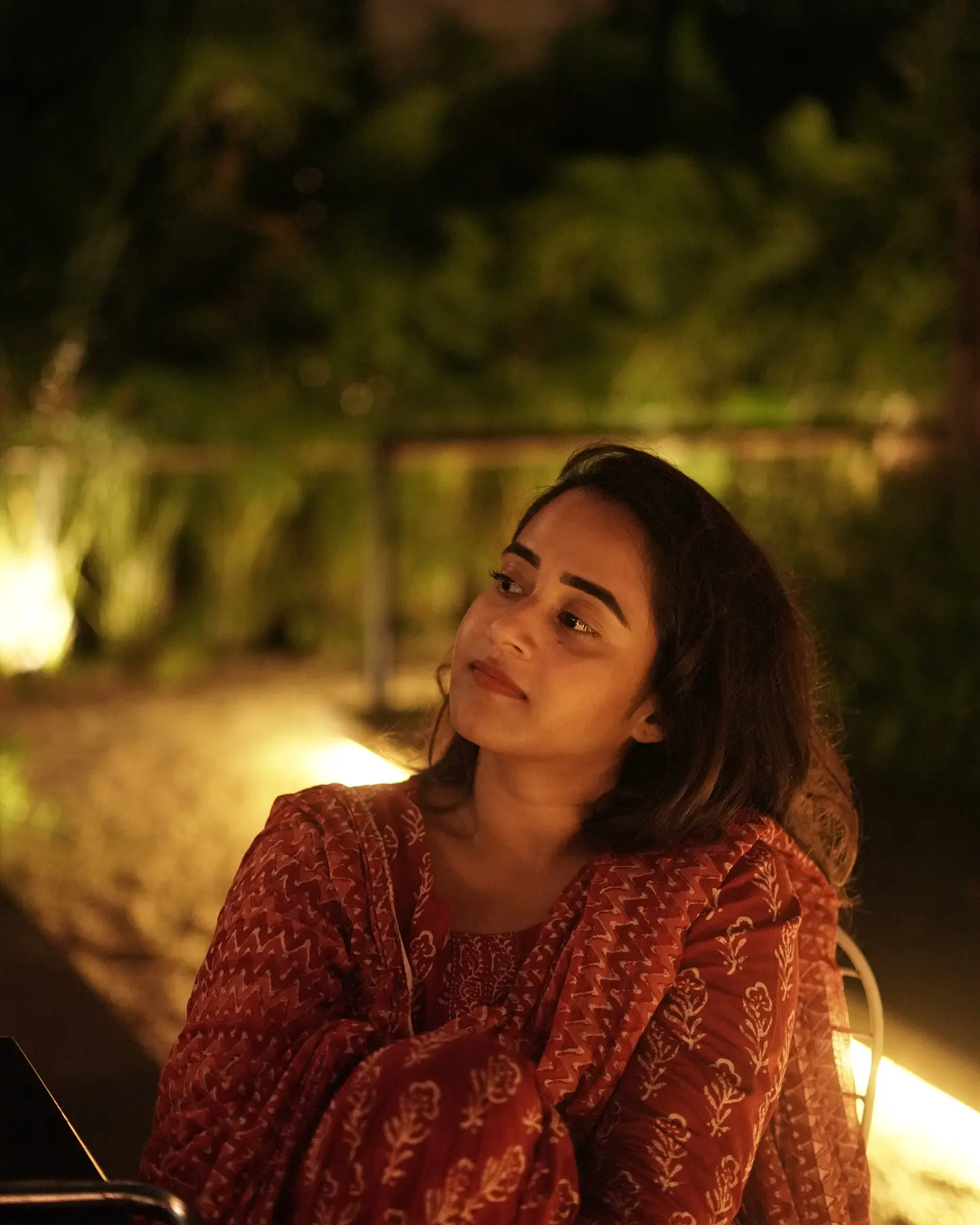Deepthi Sunaina shines under Umbrella at Night Time