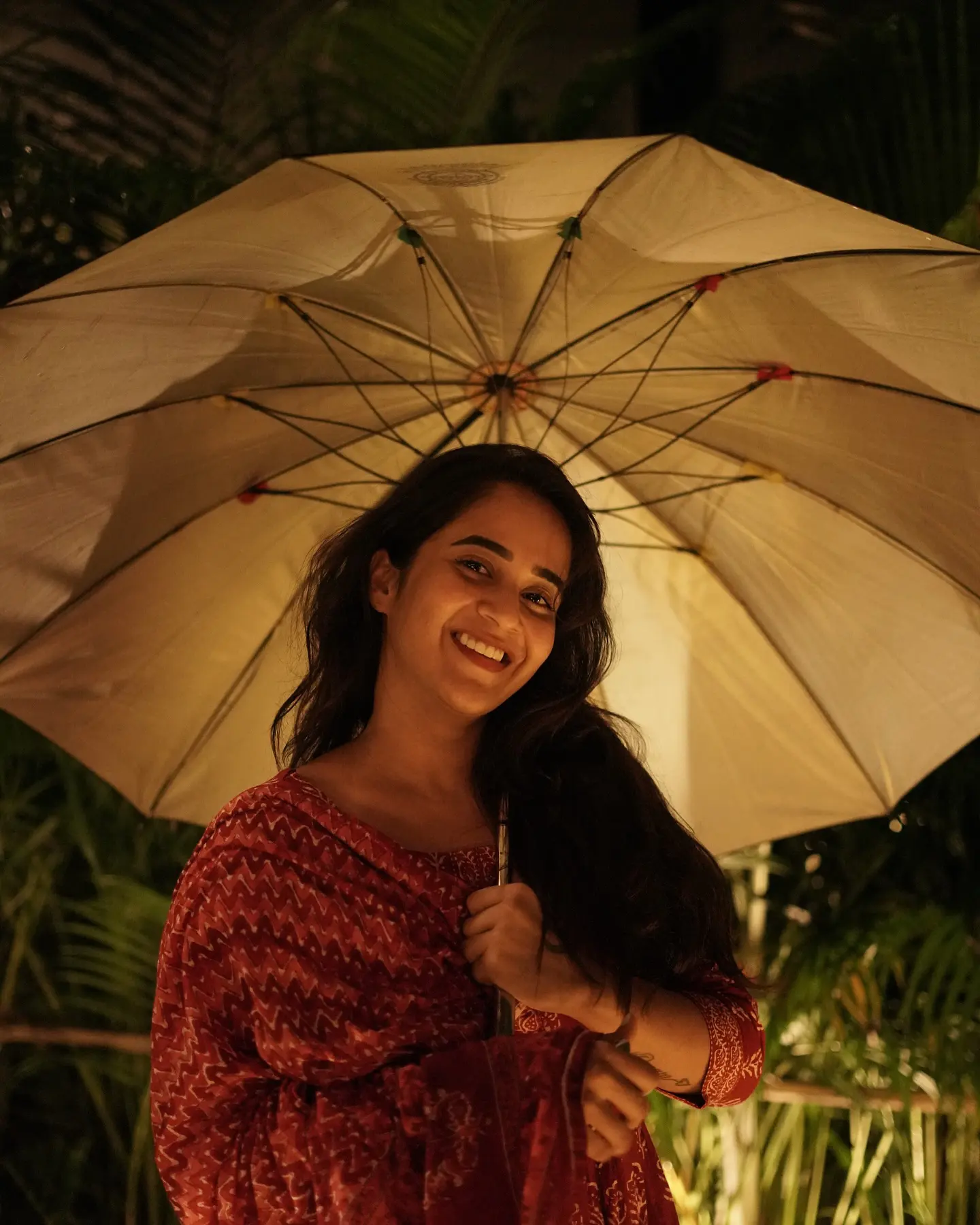 Deepthi Sunaina shines under Umbrella at Night Time