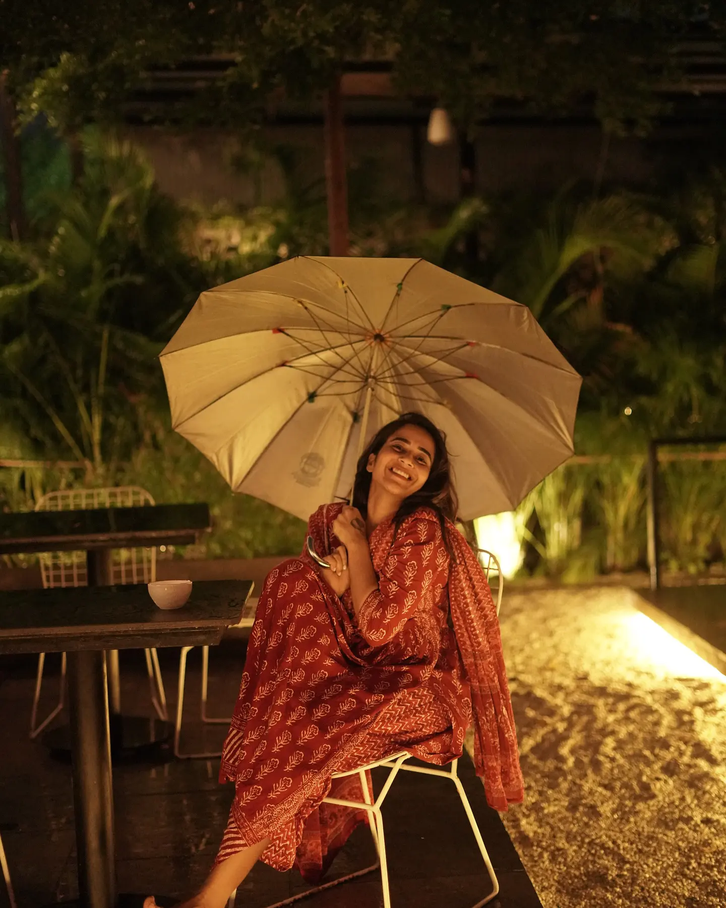 Deepthi Sunaina shines under Umbrella at Night Time