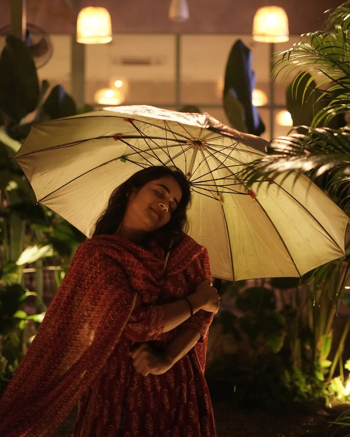 Deepthi Sunaina shines under Umbrella at Night Time