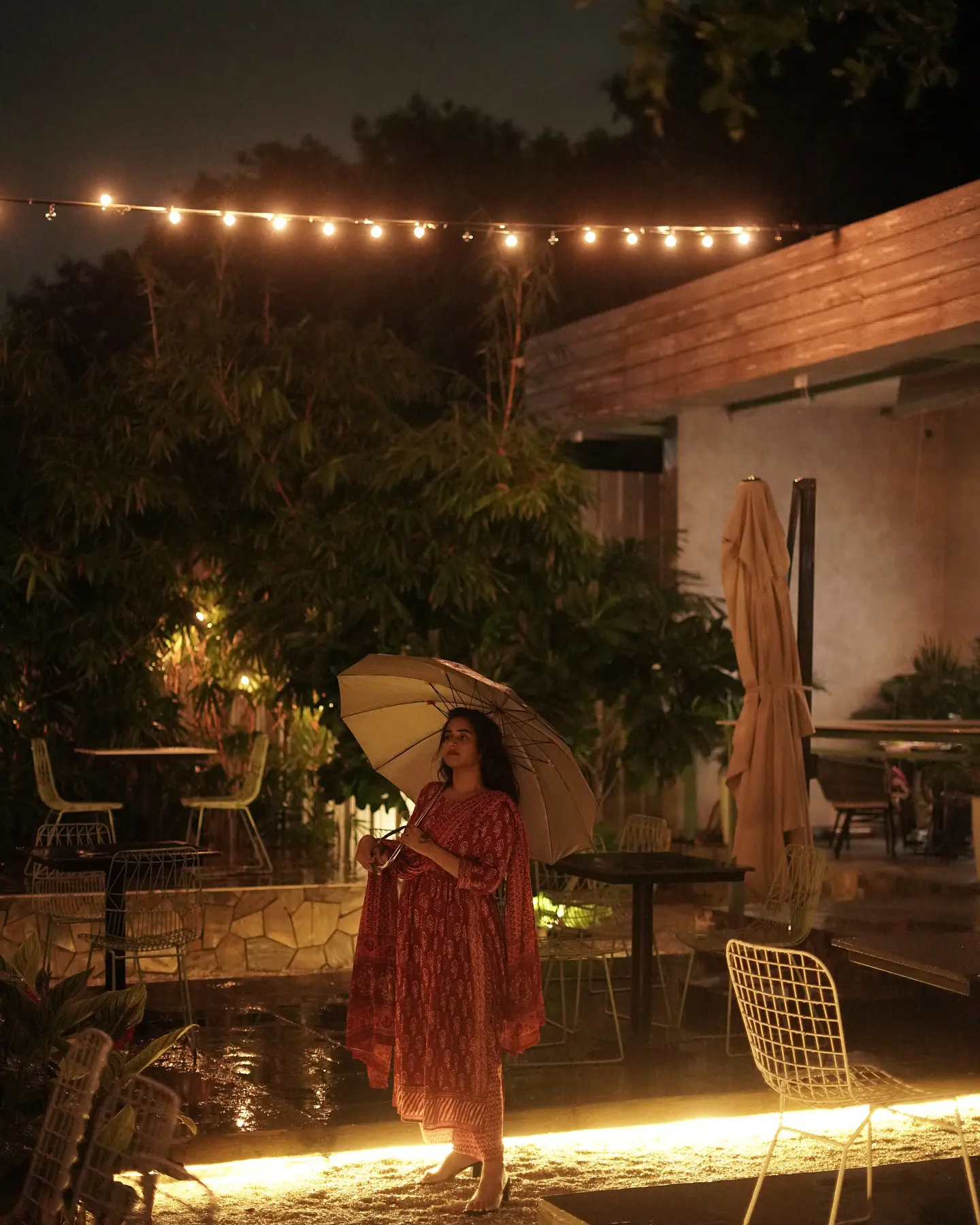 Deepthi Sunaina shines under Umbrella at Night Time