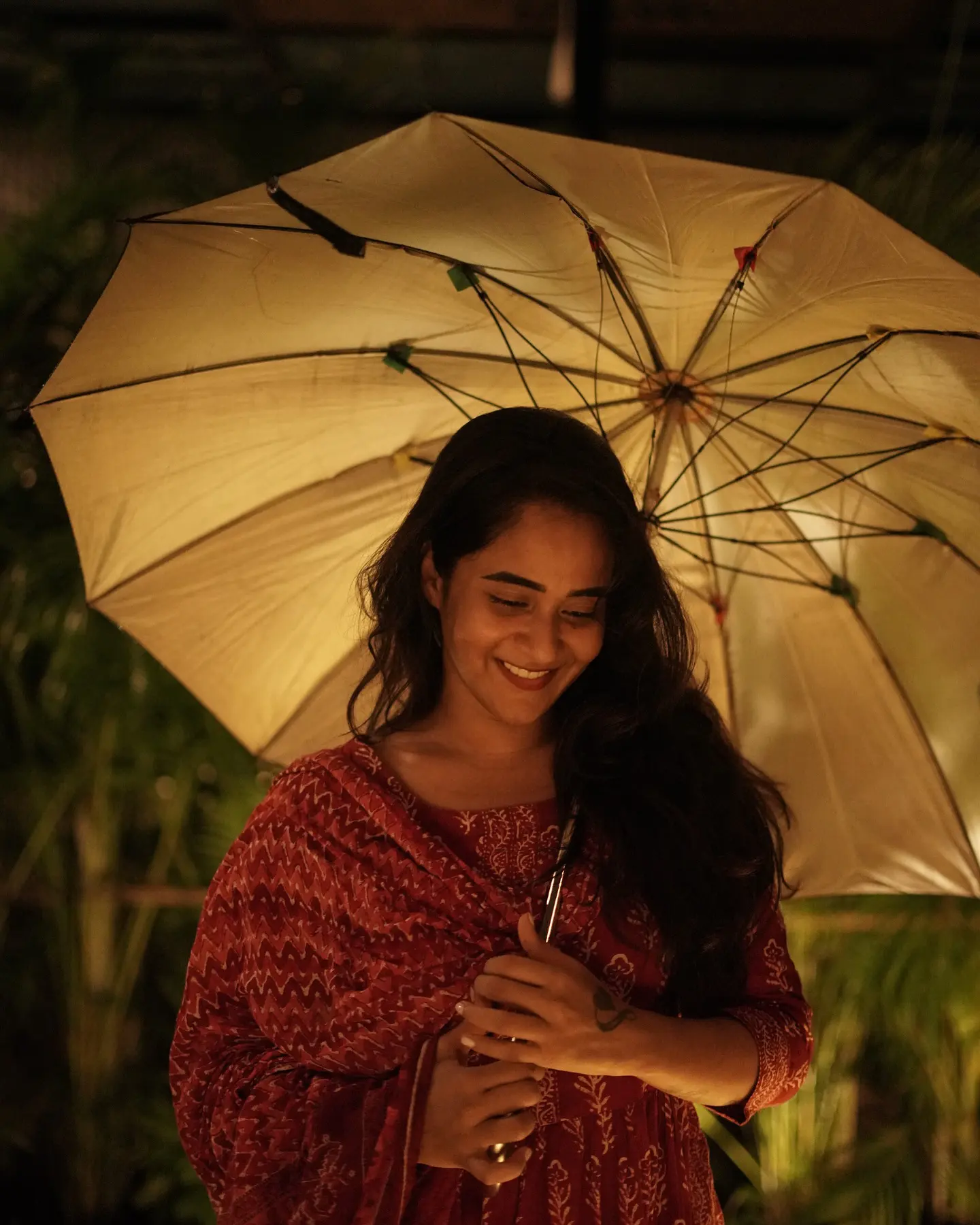 Deepthi Sunaina shines under Umbrella at Night Time