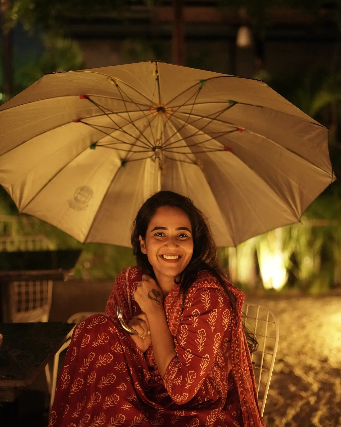 Deepthi Sunaina shines under Umbrella at Night Time