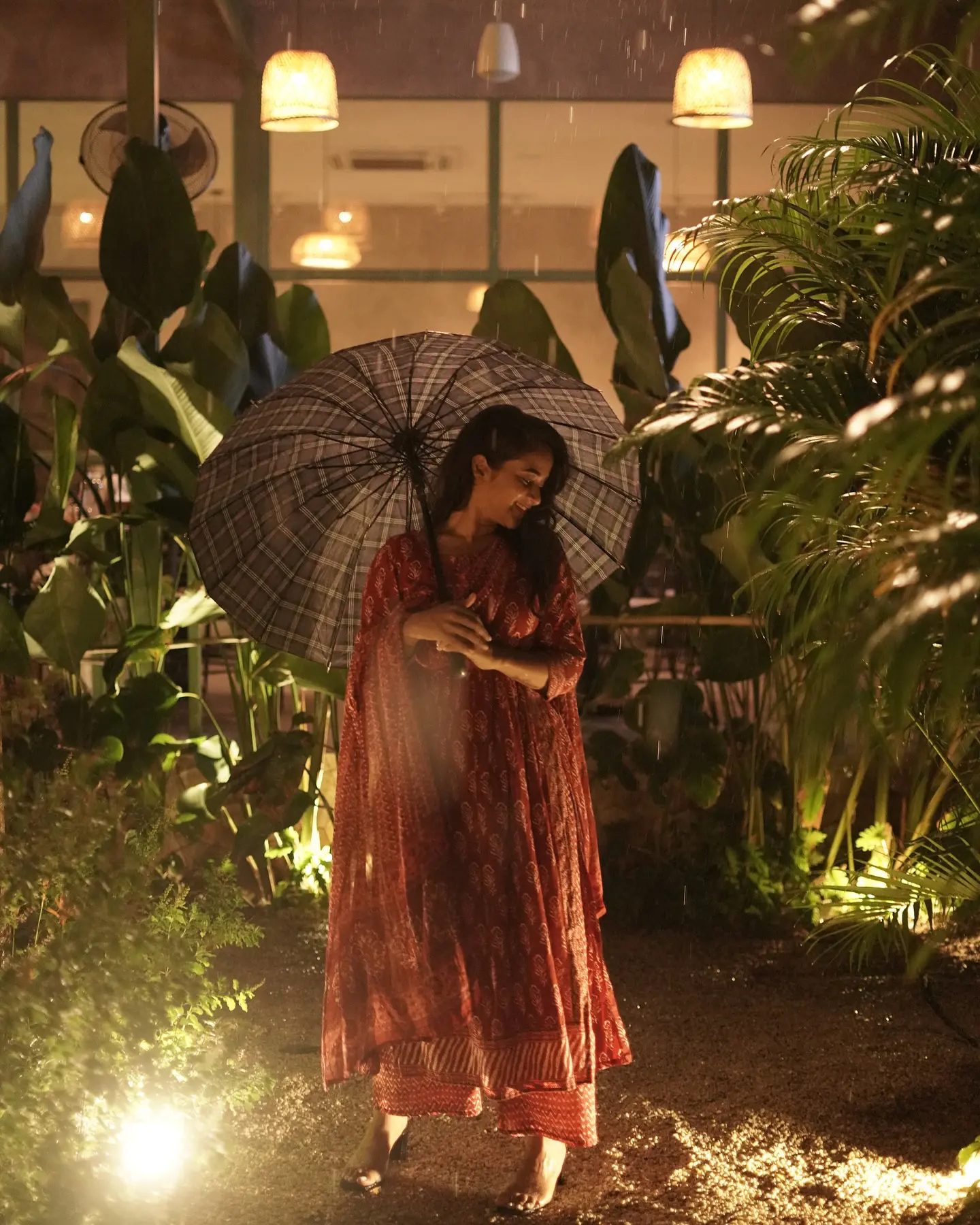 Deepthi Sunaina shines under Umbrella at Night Time