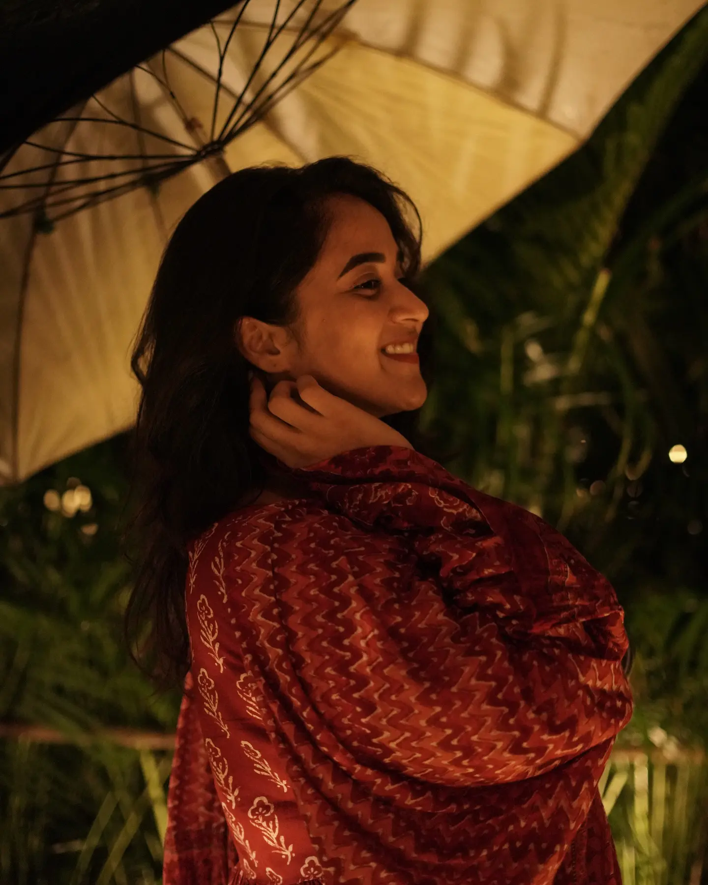 Deepthi Sunaina shines under Umbrella at Night Time