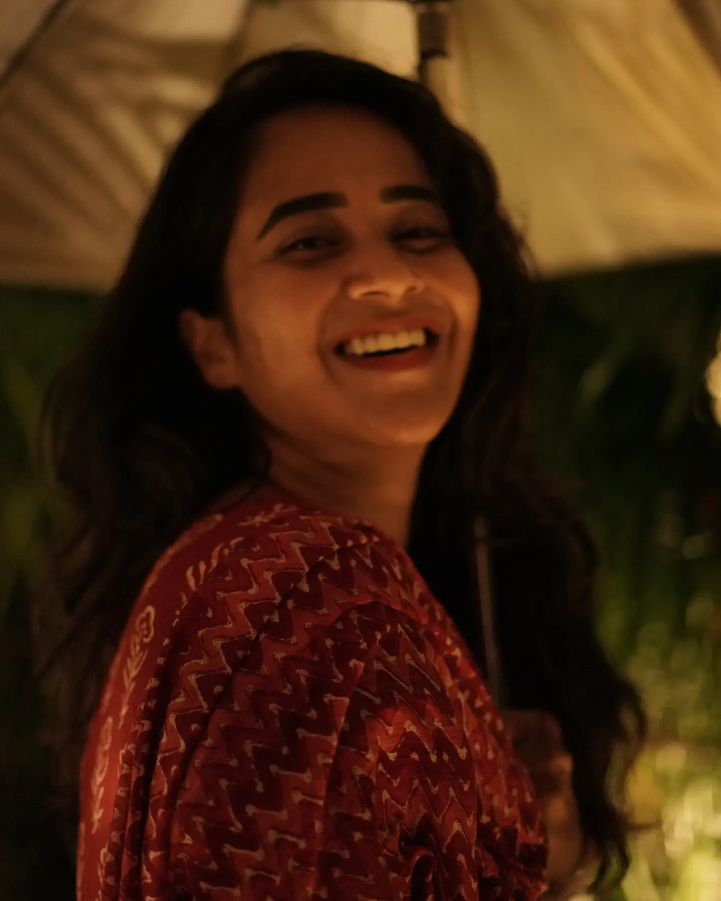 Deepthi Sunaina shines under Umbrella at Night Time