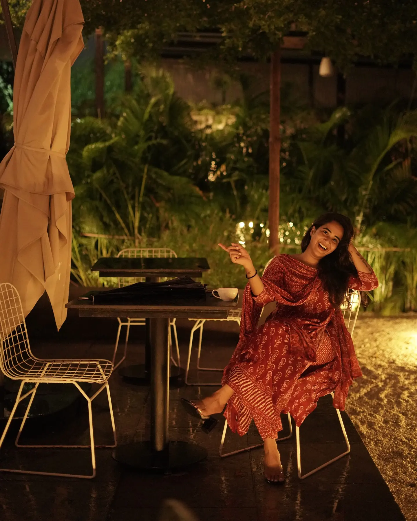 Deepthi Sunaina shines under Umbrella at Night Time