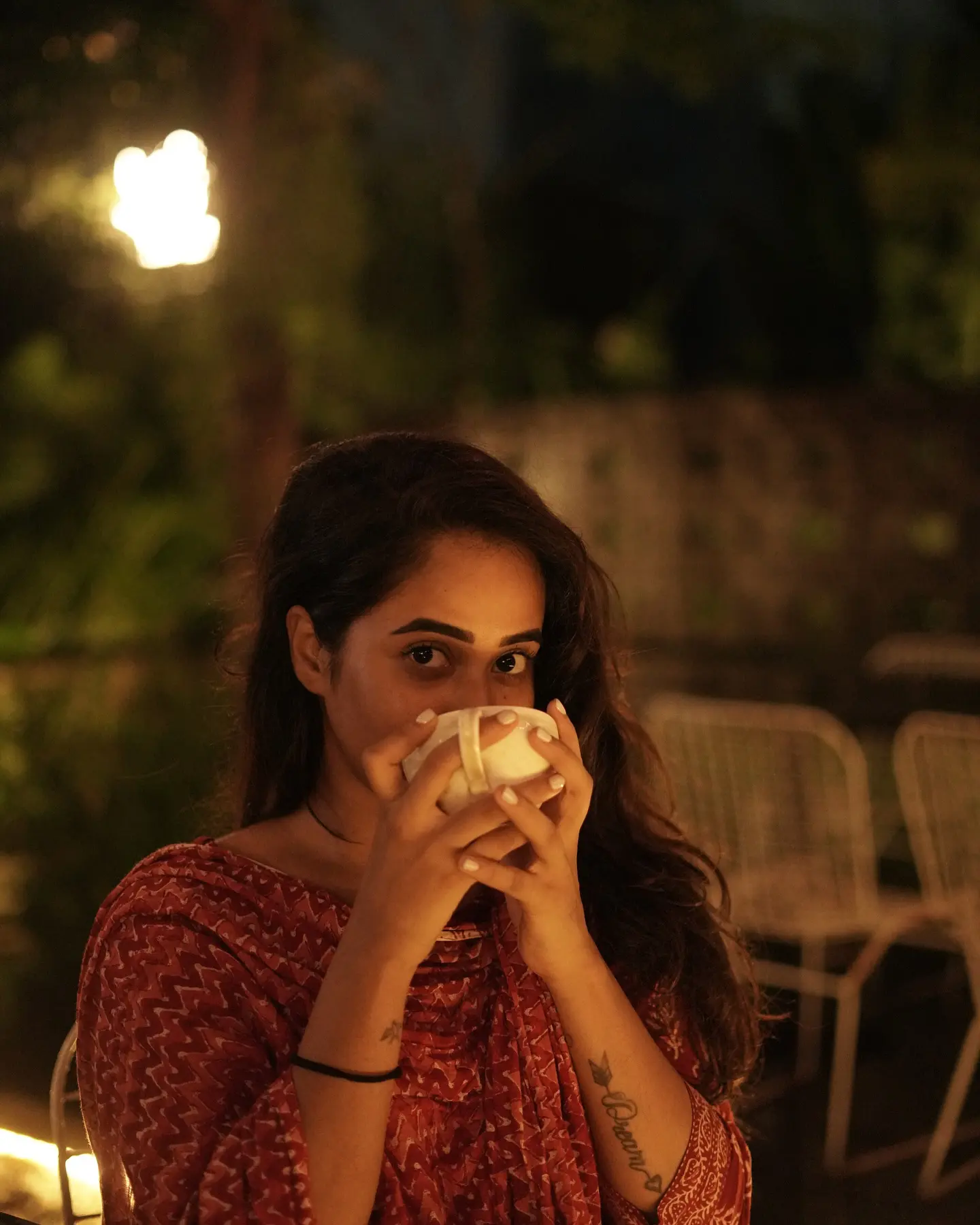 Deepthi Sunaina shines under Umbrella at Night Time