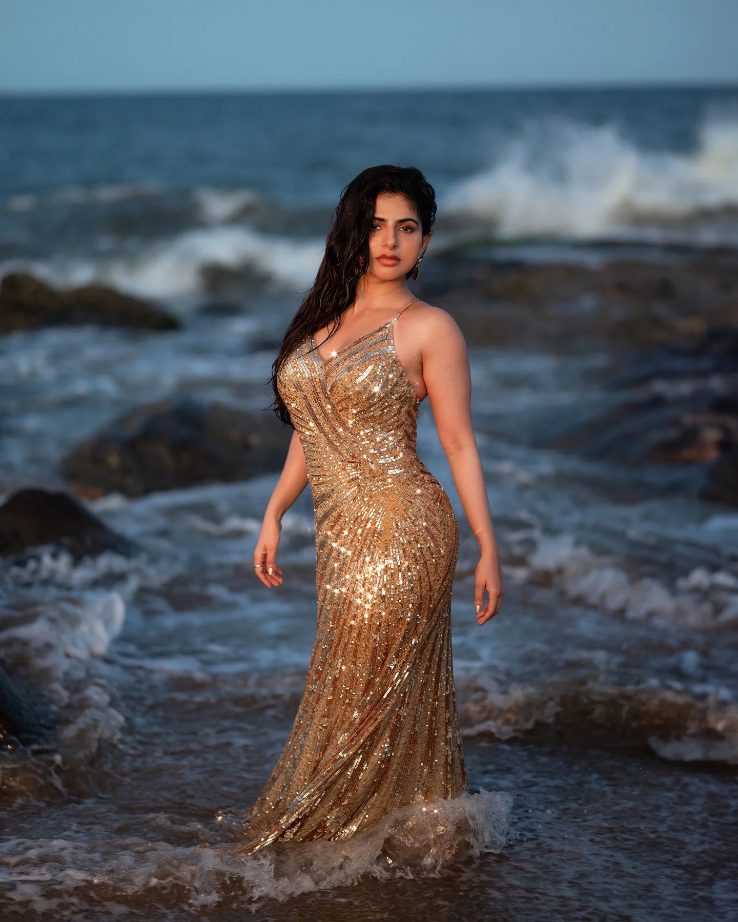 Iswarya Menon Shines like Gold at Beach