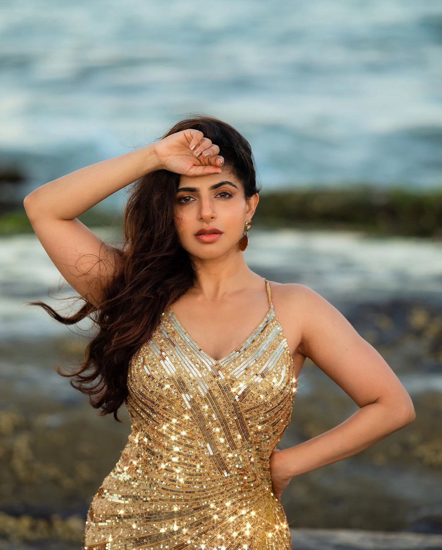 Iswarya Menon Shines like Gold at Beach